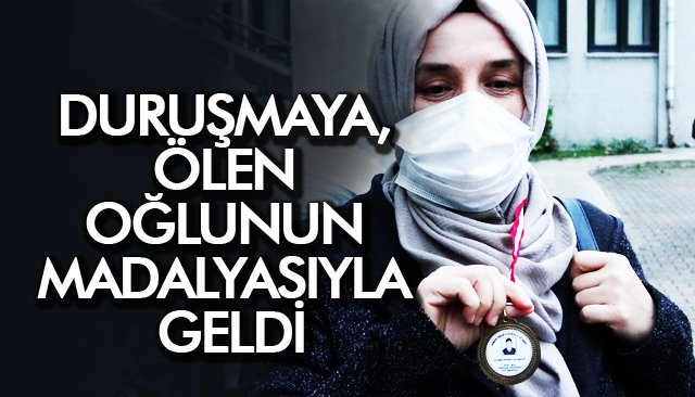 DURUŞMAYA, ÖLEN OĞLUNUN MADALYASIYLA GELDİ 