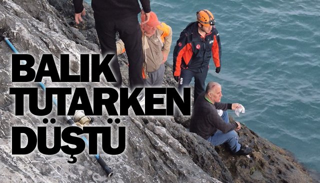 BALIK TUTARKEN  KAYALIKLARDAN DÜŞTÜ