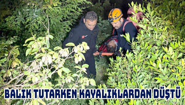BALIK TUTARKEN KAYALIKLARDAN DÜŞTÜ