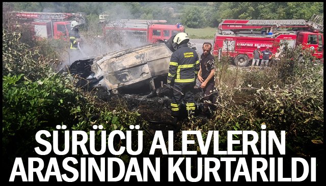 SÜRÜCÜ ALEVLERİN  ARASINDAN KURTARILDI